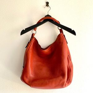 Bogner orange leather Bag and Wallet.